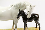 White grey mare and black foal showing ears of beswick 1811