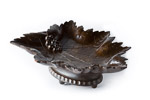 Black Forest carved fruit bowl centrepiece on oval boss and carved frieze