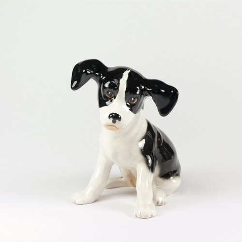Slyvac Ceramic Pottery Figurine of Small Black and White Spaniel Puppy, model 2974 in gloss glaze