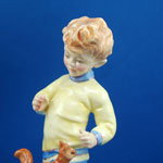 view towards hand painted head of F.G Doughty modelled royal worcester china figurine