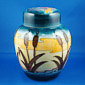 reeds silhouette against sunset Philip Richardson design for moorcroft