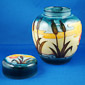 lid removed showing sunset pattern on lid top