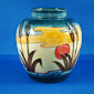 William Moorcroft Reeds at Sunset Ginger Jar lid removed under direct lighting showing deep gloss glaze