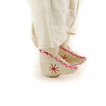 bound feet of door of hope doll with star stitching