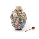 Chinese moulded porcelain eighteen luohan snuff bottle with Qianlong mark