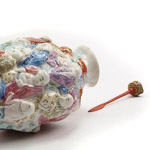 original 19th century carved bone snuff bottle spoon, stained coral red and with original cork