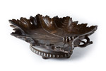 Antique Black Forest Musical Fruit Bowl view showing detail to carved branch of vine leaf