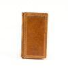 Pockaet book with tan claf leather with gilt border decoration