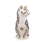 Front of Majestic Cat looking to left, showing golden heart locket on Majestic cat chest