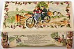 Top lid of Crown Devon glazed Pottery Daisy Bell Musical Trinket Box with scene in relief of gentleman and lady on a tandem bicycle cycling through a country landscape