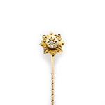 15 carat gold head of tie stick pin showing nautical rope grommet rings in gold