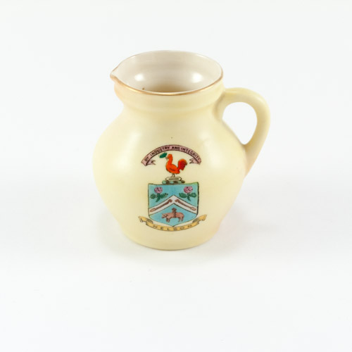 Locke & Co miniature porcelain jug with a crest of Nelson Borough, Lancashire coat of arms with Lancaster red roses