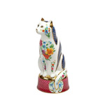 front view of white porcelain cat candle snuffer floral sprays and 22 carat gold gilding