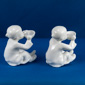 rear view of minature white figurines, showing small bump on back